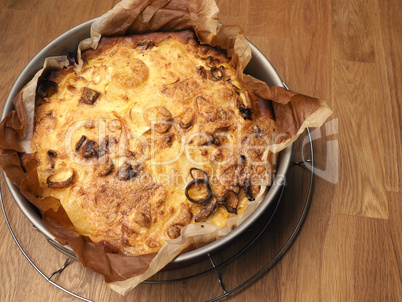 Quiche with potatoes and leeks in a springform pan, vegetarian f