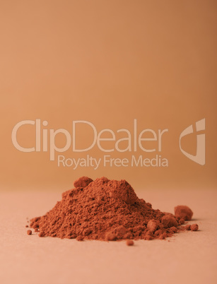 Chocolate powder on a brown background
