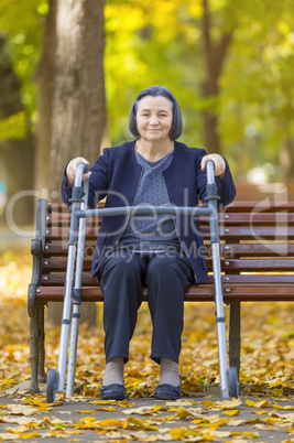 Woman with walker outdoors