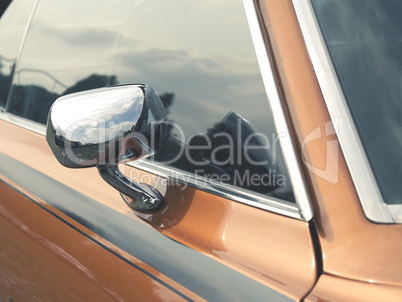 Sideview mirror of an old vintage car