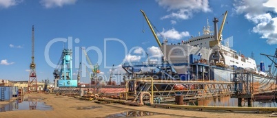 Large ship in dry dock of shipyard