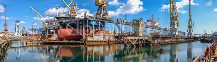 Large ship in dry dock of shipyard