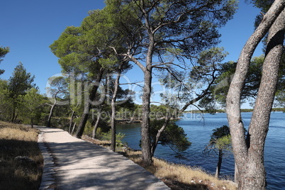 St. Anthony Canal, Sibenik, Croatia. The road along the coast of the canal