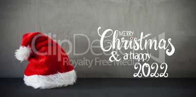 Red Santa Hat, Cement, Calligraphy Merry Christmas And Happy 2022