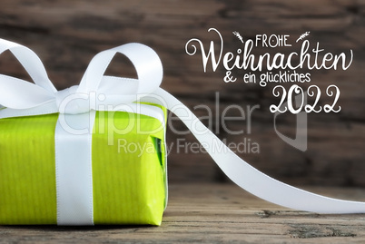 One Green Gift, White Bow, Wooden Background, Glueckliches 2022 Mean Happy 2022