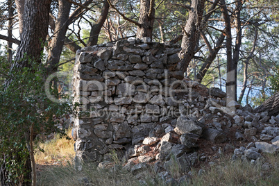 Wall of natural stones of gray color