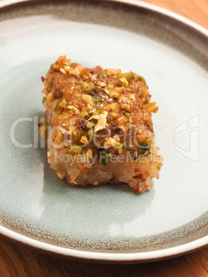 Syrian semolina cake with sugar syrup