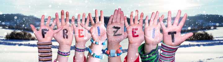 Children Hands Building Word Freizeit Means Leisure, Snowy Winter Background