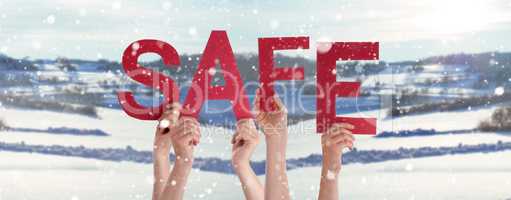 People Hands Holding Word Safe, Snowy Winter Background
