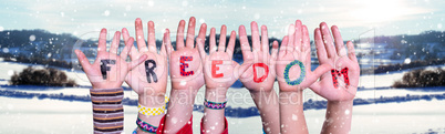 Children Hands Building Word Freedom, Snowy Winter Background