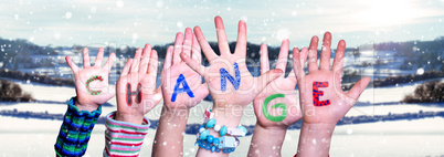 Children Hands Building Word Change, Snowy Winter Background