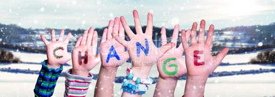 Children Hands Building Word Change, Snowy Winter Background