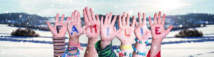 Children Hands Building Word Familie Means Family, Snowy Winter Background