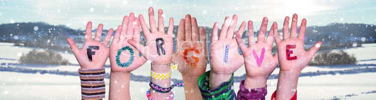Children Hands Building Word Forgive, Snowy Winter Background