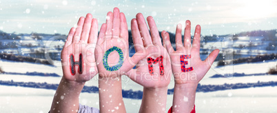 Children Hands Building Word Home, Snowy Winter Background