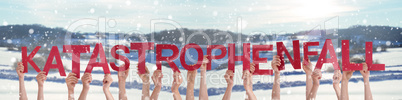 People Hands Holding Word Katastrophenfall Means Emergency, Winter Background