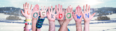 Kids Hands Holding Word Lockdown, Snowy Winter Background