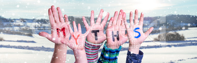 Kids Hands Holding Word Myths, Snowy Winter Background