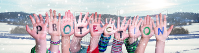 Kids Hands Holding Word Protection, Snowy Winter Background