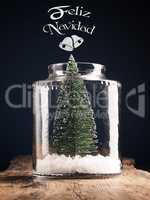 A Christmas tree in a jar with snow, Spanish Christmas greeting