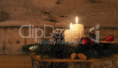 Second Advent candle burning, traditional Christmas decoration