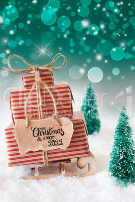 Sled, Present, Snow, Merry Christmas And A Happy 2022, Green Background Sled, Present, Snow, Merry Christmas And A Happy 2022, Green Background