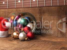 Colorful Christmas balls in glass with a fingerboard of an elect