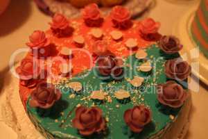 Holiday cake decorated with roses and hearts