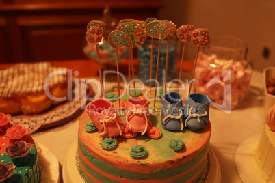 A holiday cake in blue pink colors for a gender revelation party