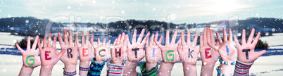 Children Hands Building Word Gerechtigkeit Mean Justice, Snowy Winter Background