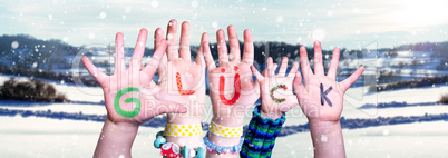 Children Hands Building Word Glueck Means Luck, Snowy Winter Background