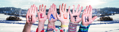 Children Hands Building Word Health, Snowy Winter Background