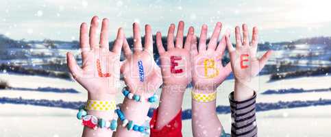 Children Hands Building Word Liebe Means Love, Snowy Winter Background