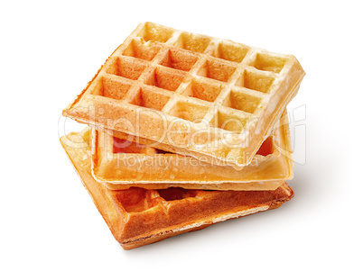 Three crispy fried french waffles isolated on white