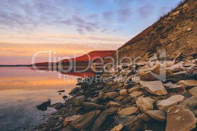 Sunrise on the hilly coast of Zay river