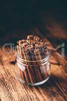 Cinnamon sticks in a glass jar