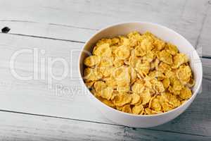 White bowl of corn flakes