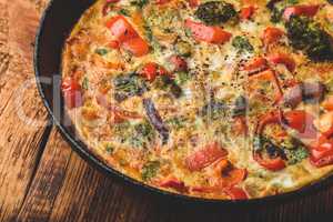 Vegetable frittata with broccoli and red pepper