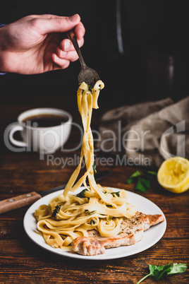 Pork chop steak with tagliatelle and capers