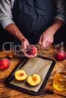 Preparing of fresh and ripe peaches