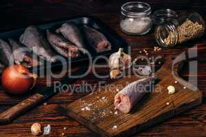 Hake carcasses on cutting board