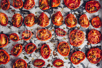 Prepared Sun Dried Tomatoes with Herbs on Parchment Paper