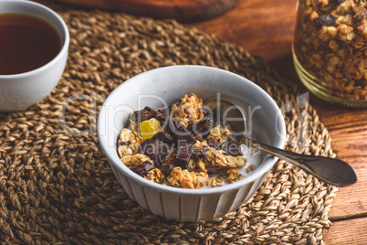 Bowl of Homemade Granola with Chocolate for Breakfast