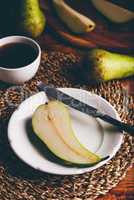 Halved Green Pear on Plate