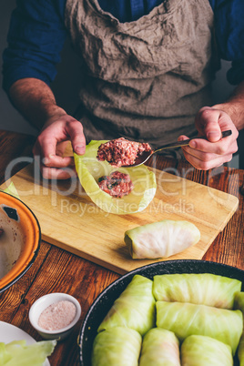 Chef Cooking White Cabbage Stuffed with Ground Meat