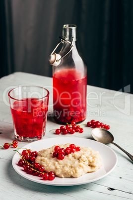 Simple breakfast with porridge and infused water