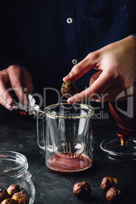 Steeping tea in glass mug