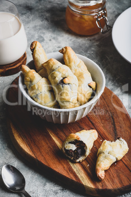 Croissants stuffed with nuts and chocolate spread