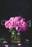 Small pink garden roses in vase