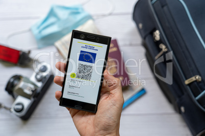 EU Digital Covid Certificate app for smartphone with quad code.